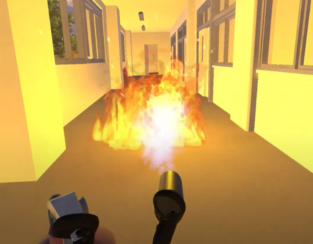 学校の廊下のようなところで火災が発生し、消火活動を行う様子をVRでシミュレーションできる